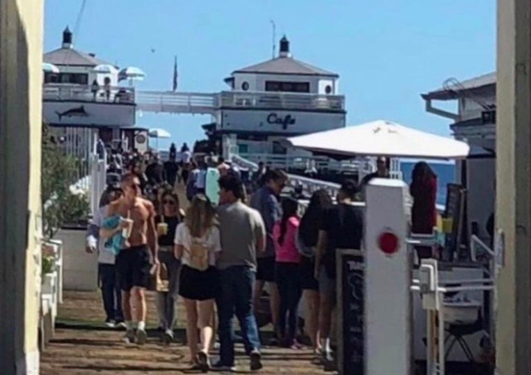 This photo, posted by Instagram user @samidenicola, shows a crowd on the Malibu Pier on March 21, 2020.