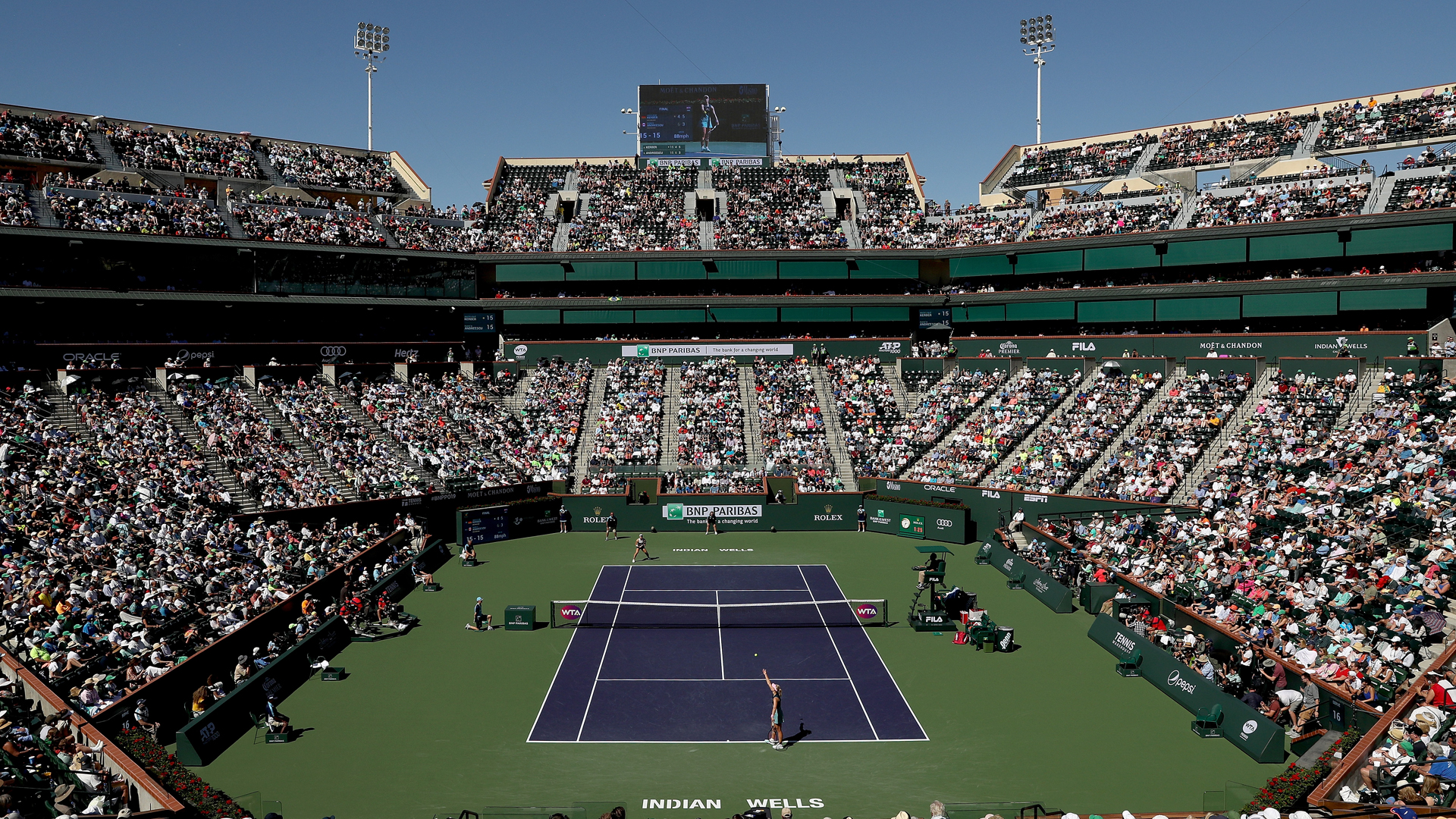 Angelique Kerber of Germany serves to Bianca Andreescu of Canada during the women's final of the BNP Paribas Open at the Indian Wells Tennis Garden on March 17, 2019 in Indian Wells, California. (Credit: Matthew Stockman/Getty Images)