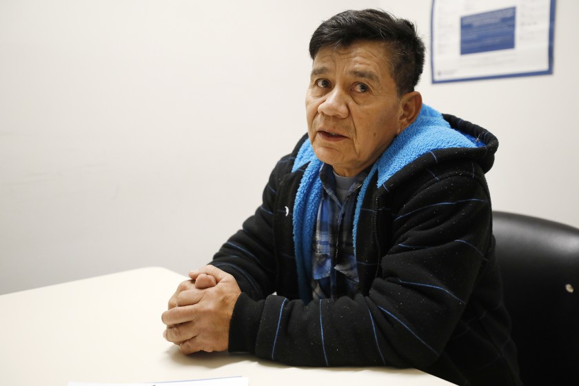 Pedro Bravo Castillo, 58, sits at a table at the Enforcement and Removal Operations processing center in downtown L.A. On March 27, 2020, a federal judge ordered that he and another immigrant be released from the Adelanto Detention Facility over COVID-19 concerns. (Al Seib / Los Angeles Times)