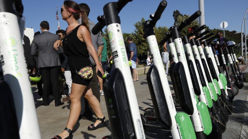 Lime electric scooters are docked in Santa Monica in this undated photo. (Credit: Genaro Molina / Los Angeles Times)