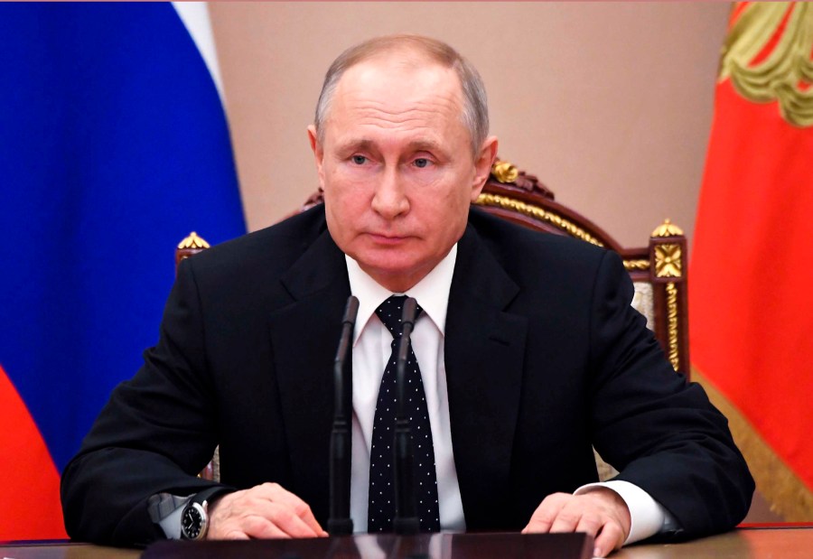 Russian President Vladimir Putin responded to criticism over the number of recorded cases. (Alexei Nikolsky/AP)