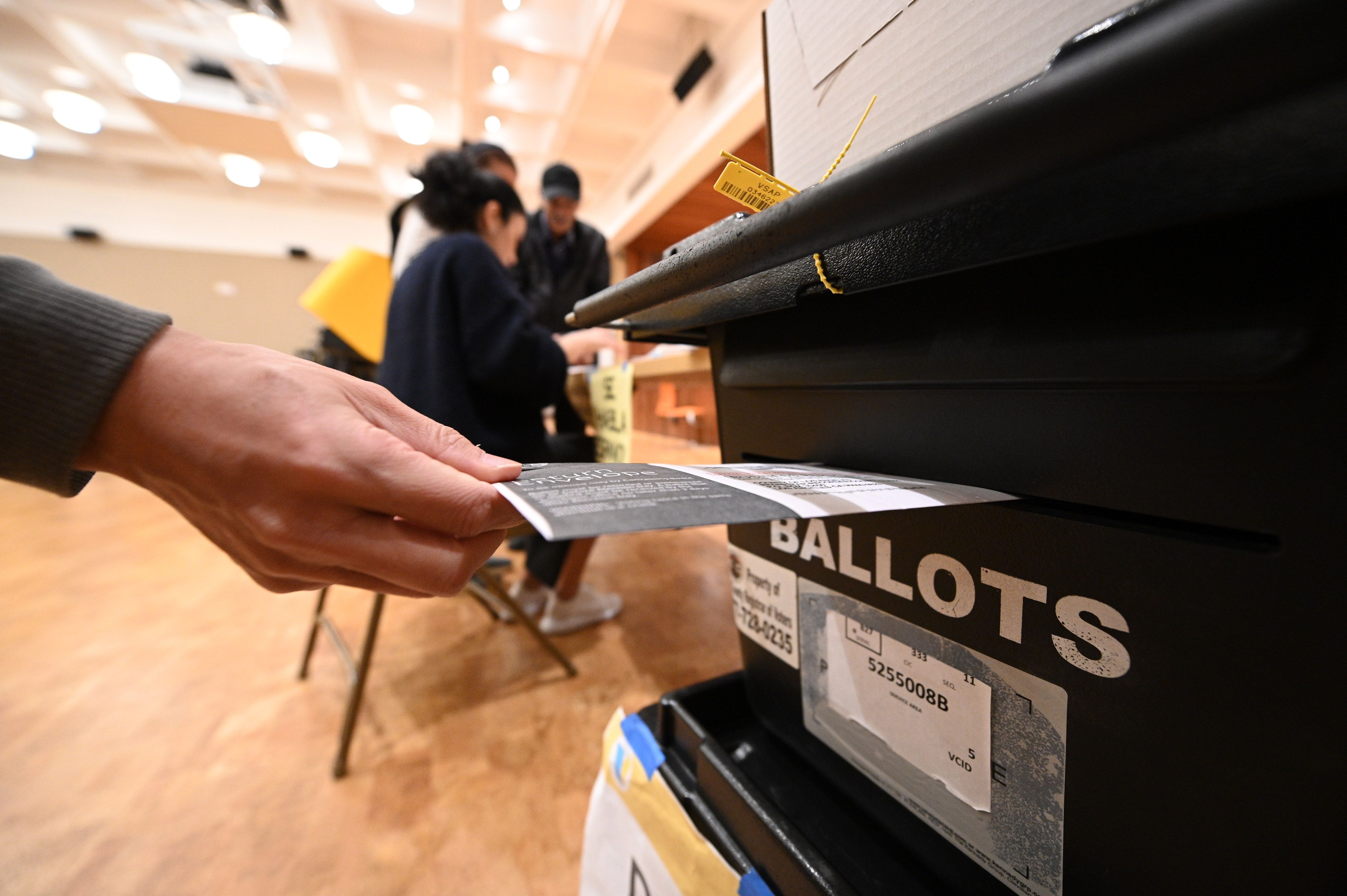 A man casts his ballot during the presidential primary vote in Glendale, California on Super Tuesday. (ROBYN BECK/AFP via Getty Images)