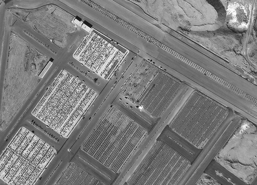 Satellite image of a cemetery in Qom appears to show new burial plots that were not in images taken before the coronavirus outbreak. Satellite image ©2020 Maxar Technologies)