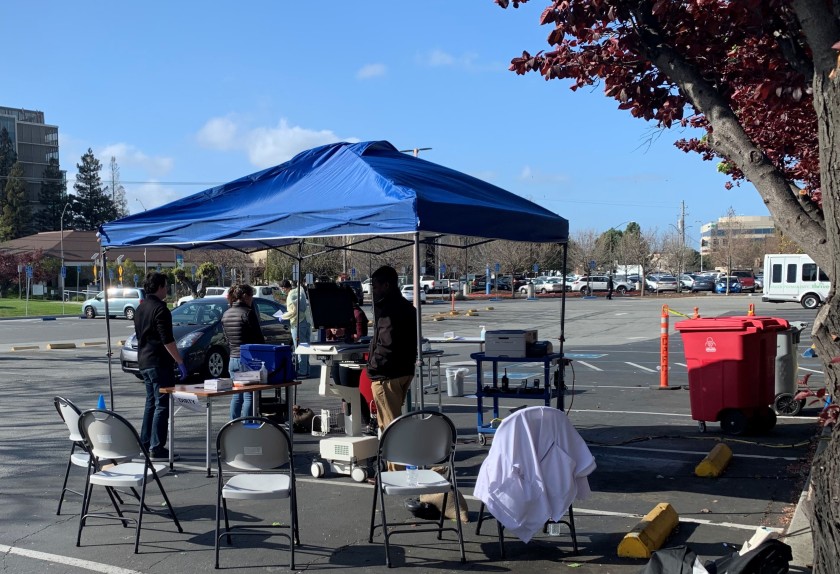 Medical staff prepare to test Kaiser members for the coronavirus on March 13, 2020 in Redwood City. (Susanne Rust / Los Angeles Times)