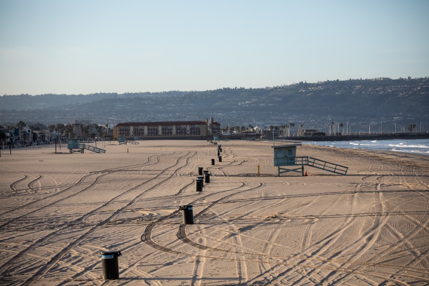 The Strand walking path and the beach at Hermosa Beach, shown in this undated photo, are closed to slow the spread of the coronavirus. (Jay L. Clendenin / Los Angeles Times)