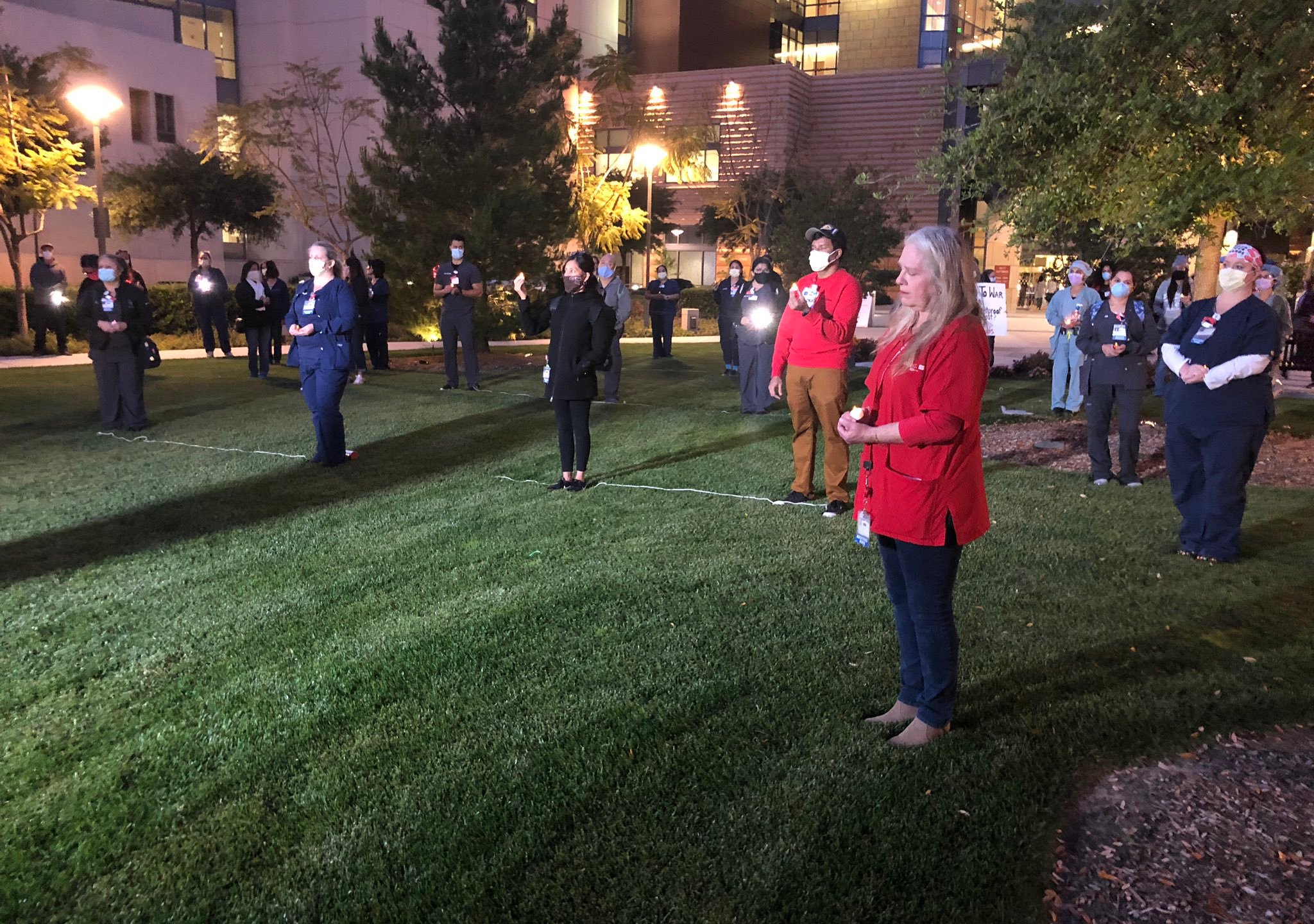 Healthcare workers at UCI Medical Center held a vigil on April 20, 2020, for all those affected by COVID-19. (KTLA)