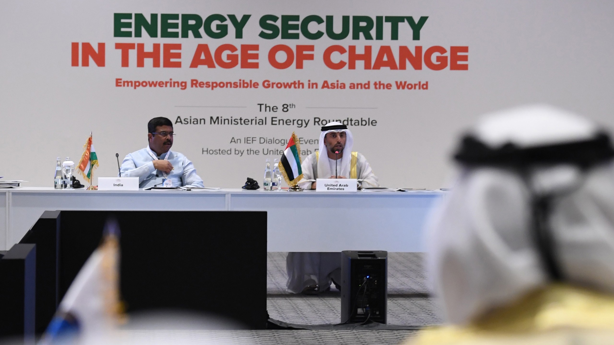 Indian Oil Minister Dharmendra Pradhan (L) listens as the United Arab Emirates' Energy Minister Suheil al-Mazrouei (C ) addreses the 24th World Energy Congress (WEC) in the Emirati capital Abu Dhabi on September 10, 2019. The OPEC petroleum exporters' cartel and key independent producers are deliberating how to halt a slide in prices that has persisted despite previous cuts and US sanctions that have squeezed supply from Iran and Venezuela. (KARIM SAHIB/AFP via Getty Images)