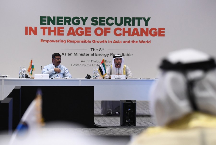 Indian Oil Minister Dharmendra Pradhan (L) listens as the United Arab Emirates' Energy Minister Suheil al-Mazrouei (C ) addreses the 24th World Energy Congress (WEC) in the Emirati capital Abu Dhabi on September 10, 2019. The OPEC petroleum exporters' cartel and key independent producers are deliberating how to halt a slide in prices that has persisted despite previous cuts and US sanctions that have squeezed supply from Iran and Venezuela. (KARIM SAHIB/AFP via Getty Images)