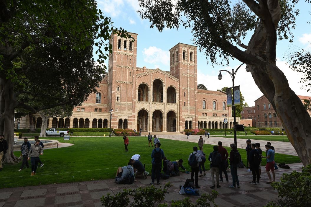 Students seen near Royce Hall on the UCLA campus on March 11, 2020. (Robyn Beck / AFP / Getty Images)