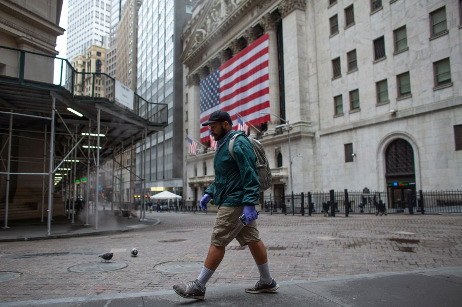 A man walks by the NYSE on April 09, 2020 in New York City. (Kena Betancur/Getty Images)