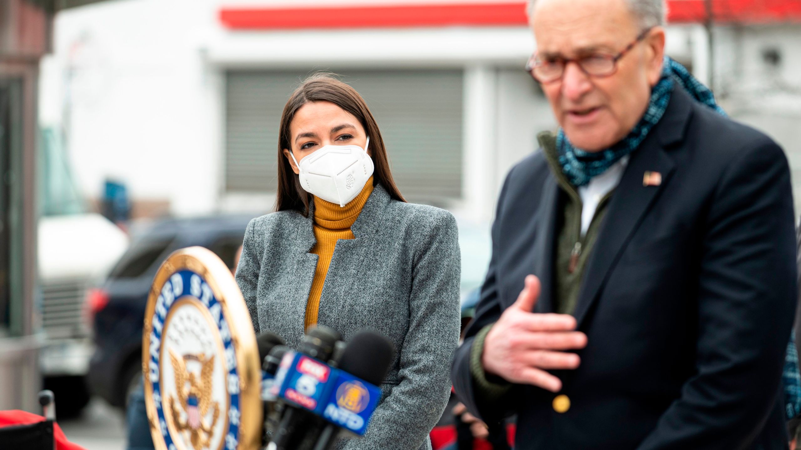 Senate Minority Leader Chuck Schumer speaks as Congresswoman Alexandria Ocasio-Cortez listens during a press conference in the Corona neighborhood of Queens on April 14, 2020. (JOHANNES EISELE/AFP via Getty Images)