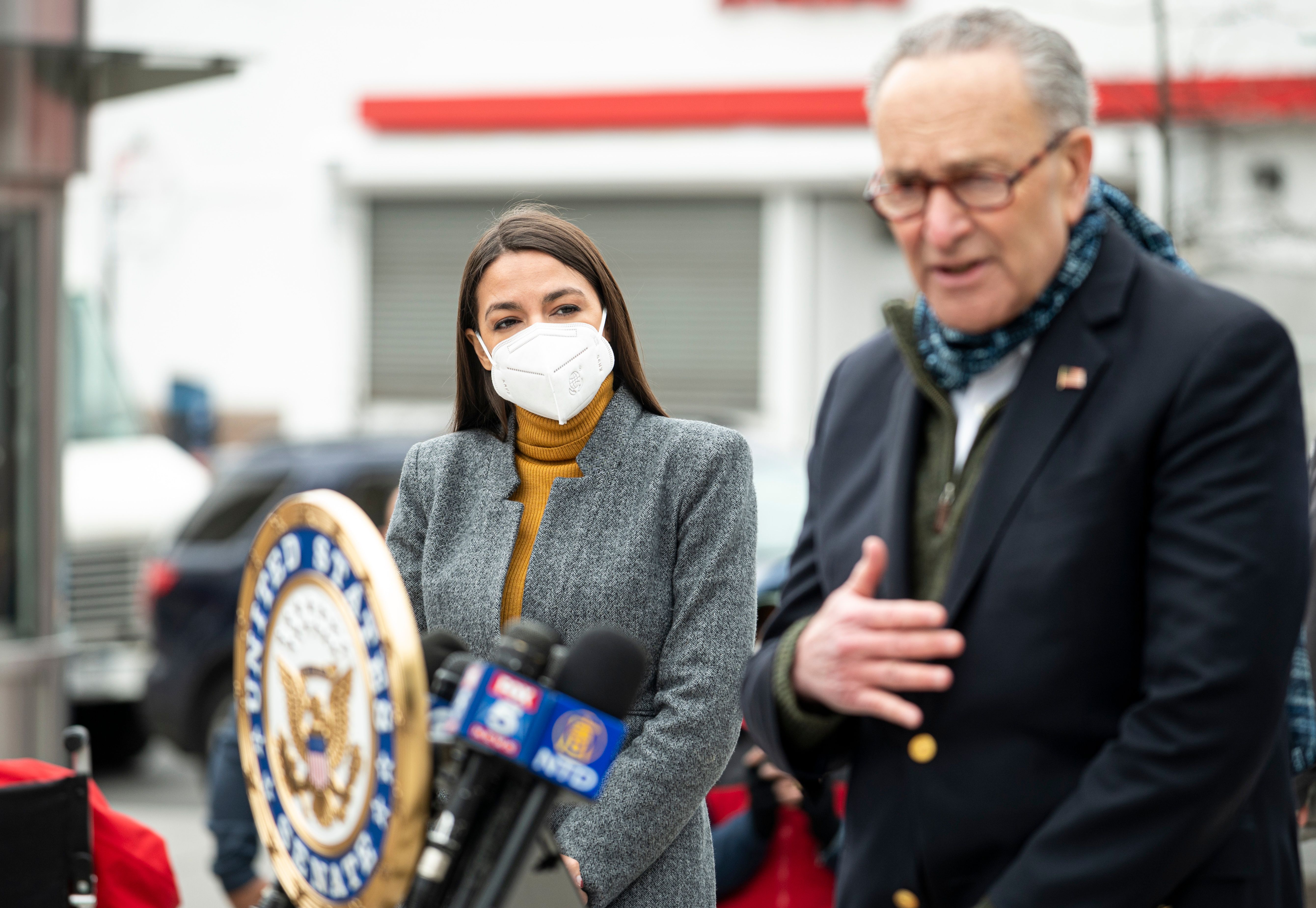 Senate Minority Leader Chuck Schumer speaks as Congresswoman Alexandria Ocasio-Cortez listens during a press conference in the Corona neighborhood of Queens on April 14, 2020. (JOHANNES EISELE/AFP via Getty Images)