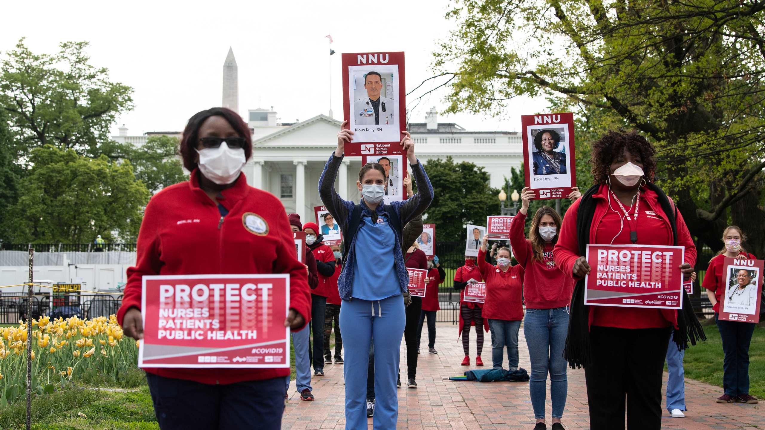 Nurses protest outside the White House against their lack of personal protection equipment on April 21, 2020. (Credit: NICHOLAS KAMM / AFP / Getty Images)