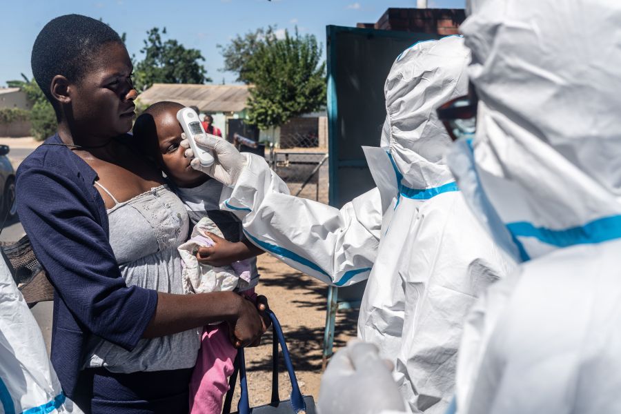 Medical personnel check temperatures of patients visiting Mpilo Hospital in Bulawayo, Zimbabwe on April 25, 2020. The number of cases of coronavirus in Africa is currently low compared to the rest of the planet: nearly 28,000 on the continent against more than 2.7 million worldwide, according to an AFP count. (ZINYANGE AUNTONY/AFP via Getty Images)