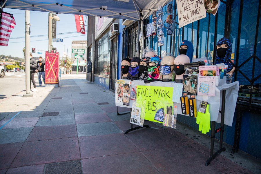 A street vendor sells face masks from a pop up stand on April 15, 2020, in Los Angeles, California. (Rich Fury/Getty Images)