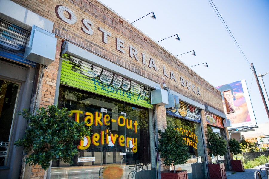 The storefront of restaurant Osteria La Buca in Los Angeles is seen on April 15, 2020. (Credit: Rich Fury / Getty Images)