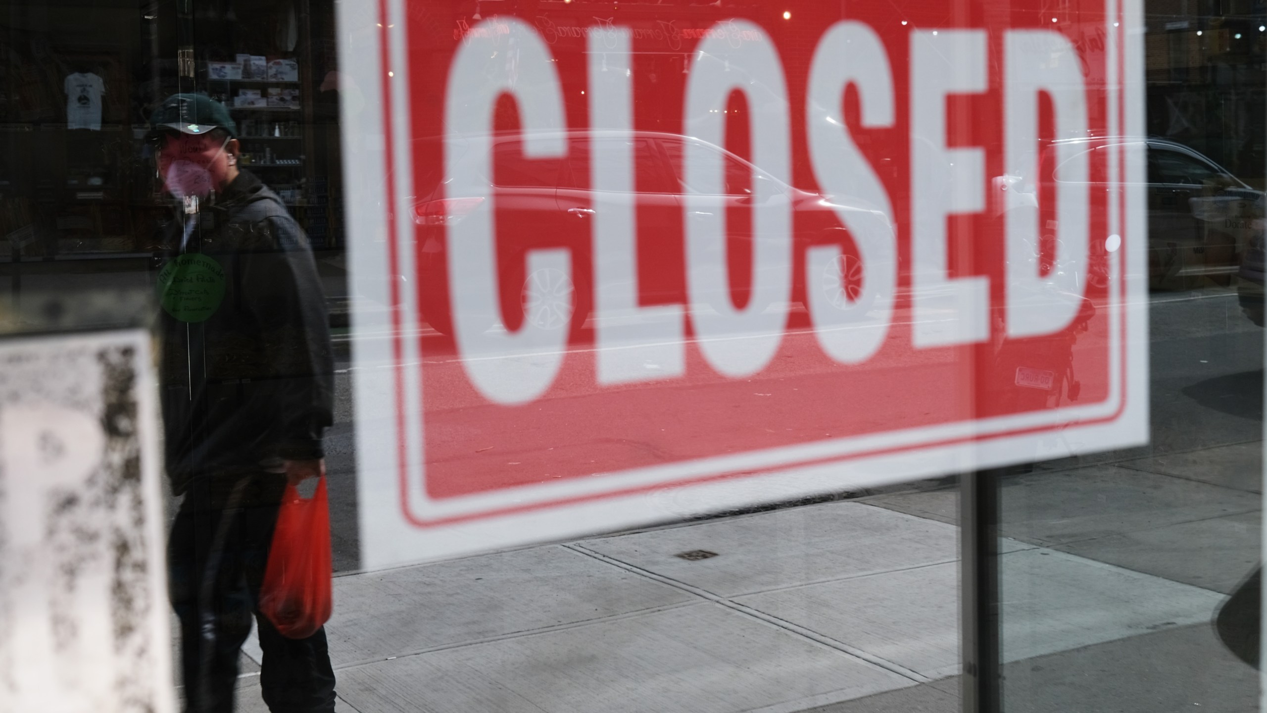 A store stands closed as the coronavirus keeps financial markets and businesses mostly closed on April 21, 2020, in New York City. (Spencer Platt/Getty Images)