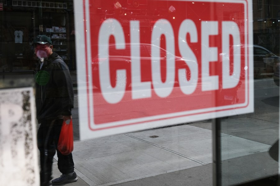 A store stands closed as the coronavirus keeps financial markets and businesses mostly closed on April 21, 2020, in New York City. (Spencer Platt/Getty Images)