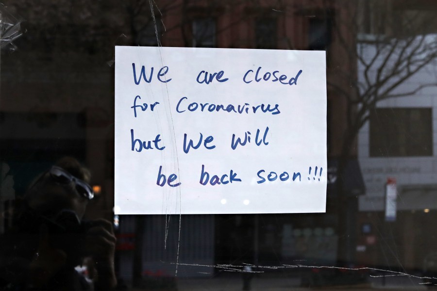 A sign in a restaurant window reads "we are closed for coronavirus but we will be back soon!!!" on April 21, 2020 in New York City. (Cindy Ord/Getty Images)