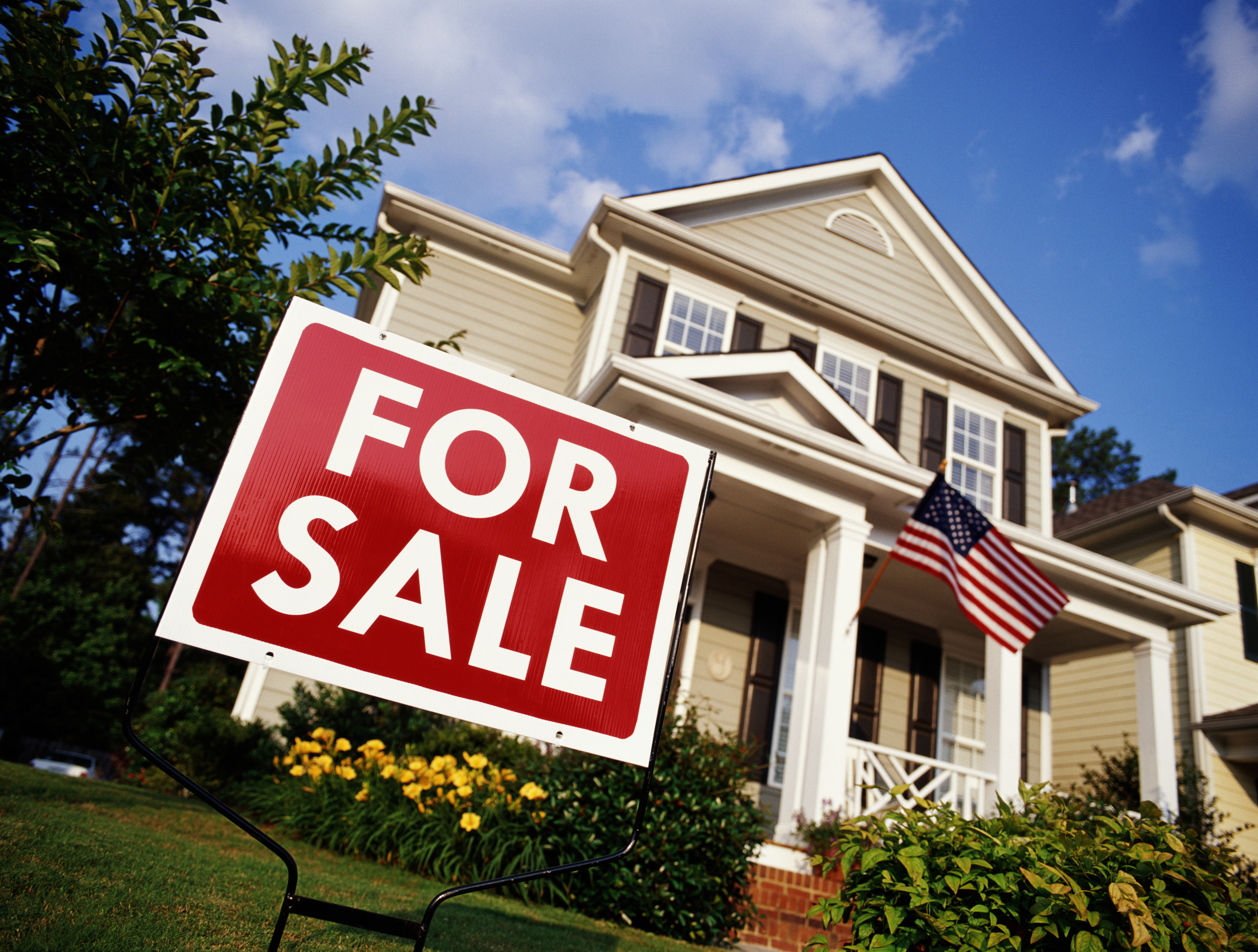 A "for sale" sign is seen outside a home in Georgia in this this file photo. (Getty Images)