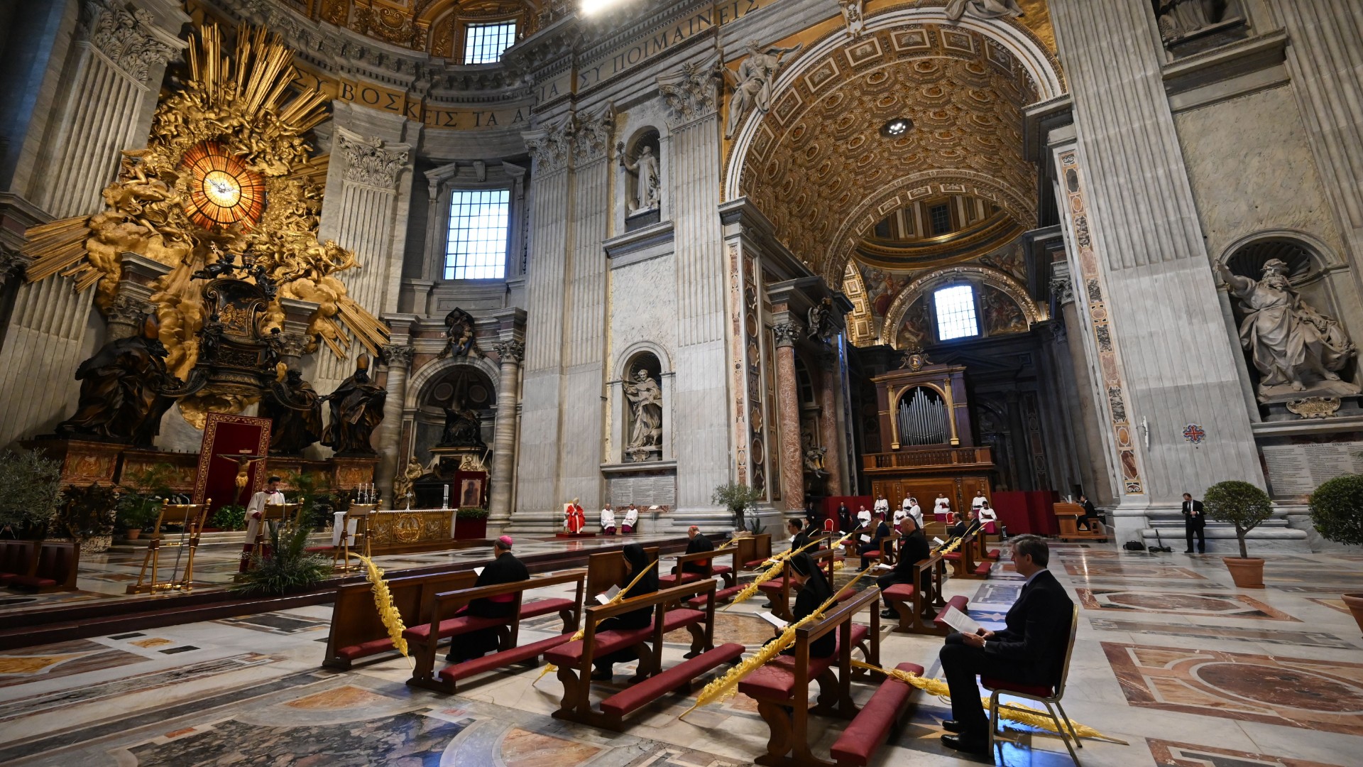 A general view shows Pope Francis (Rear C) and attendees during Palm Sunday mass behind closed doors at the Chair of Saint Peter in St. Peter's Basilica mass on April 5, 2020 in The Vatican, during the lockdown aimed at curbing the spread of the COVID-19 infection, caused by the novel coronavirus. (Alberto Pizzoli/POOL/AFP/Getty Images)