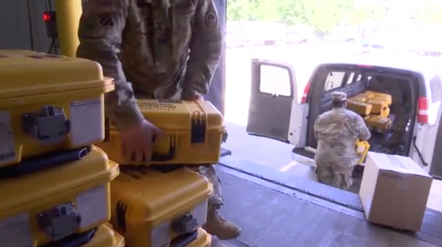 Members of the National Guard transport ventilators from the federal government’s national stockpile to hospitals across Louisiana on April 2, 2020. (WBRZ via CNN)