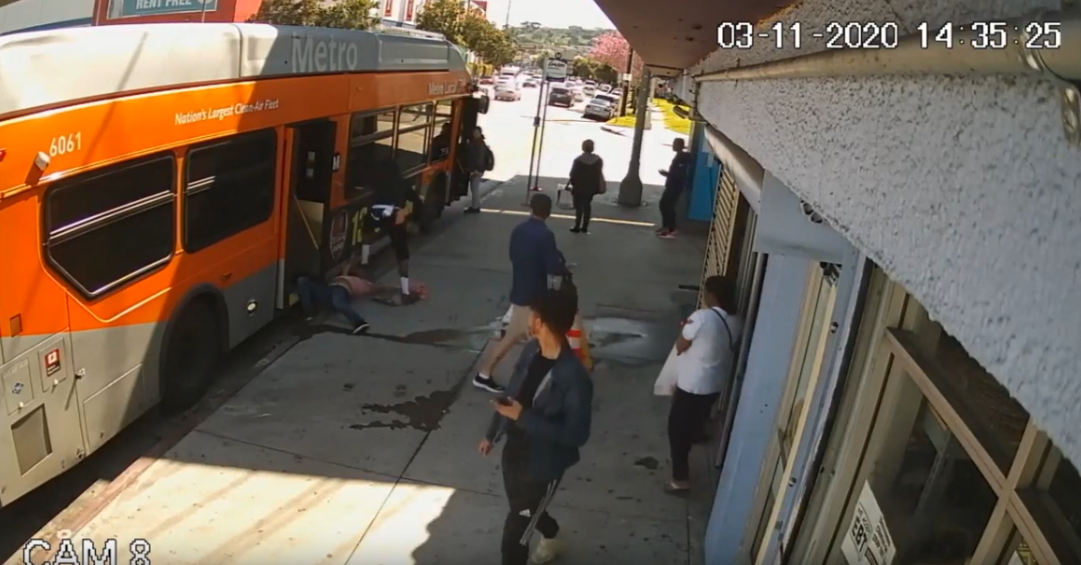 A man is seen attacking another man getting off a bus on March 11, 2020 in video released by the LAPD.