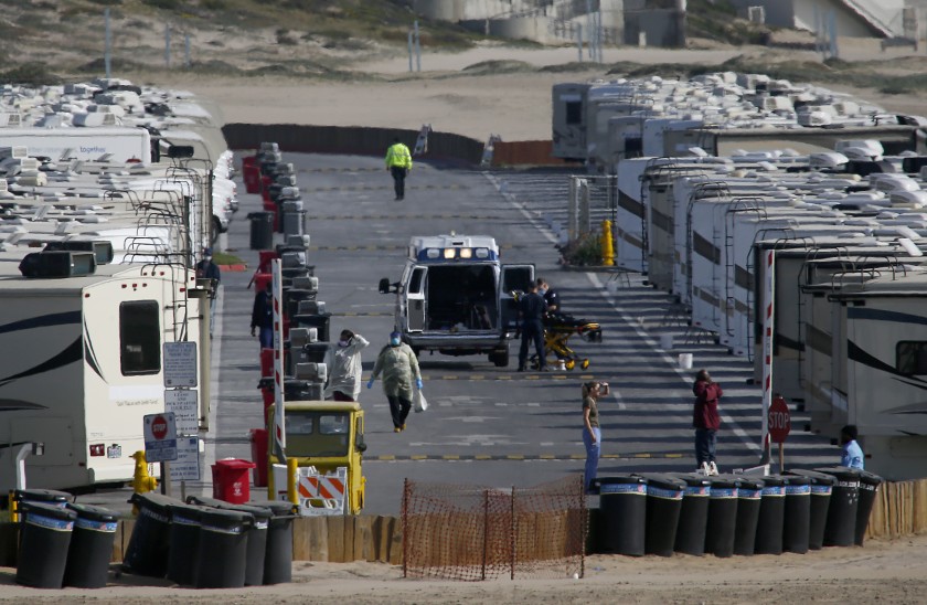 More than 100 RVs are parked at Dockweiler State Beach in Los Angeles to house people who have tested positive or have symptoms of COVID-19. Many of the patients are homeless.(Luis Sinco / Los Angeles Times)