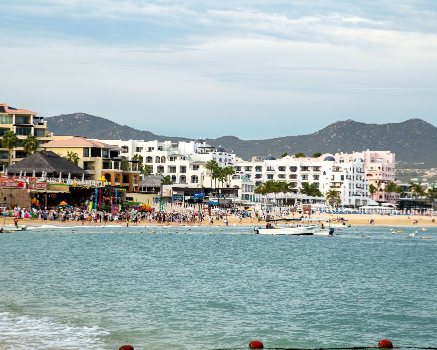 People walk on the beach in Cabo San Lucas, Mexico, on March 23, 2020. (Shutterstock)