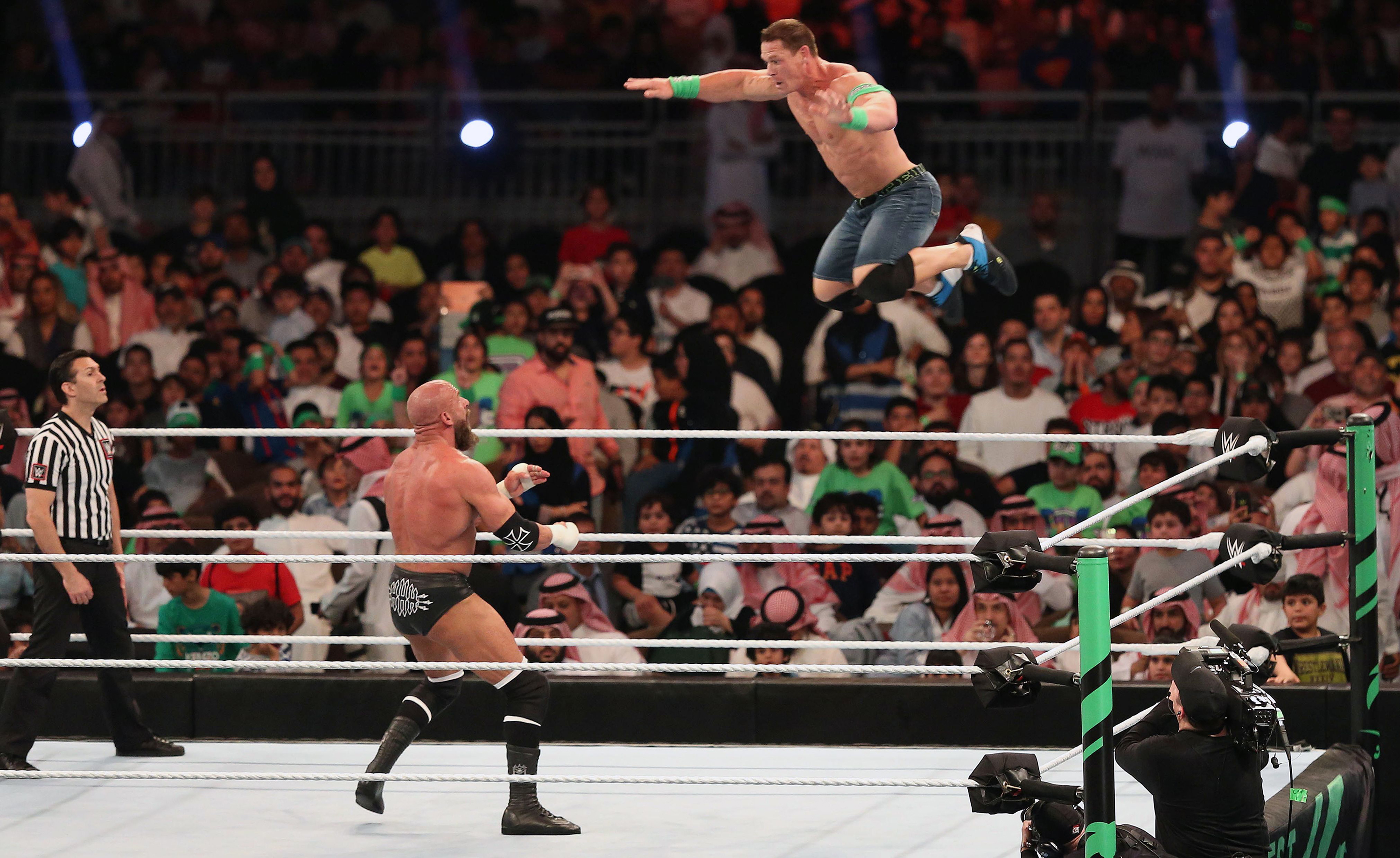 World Wrestling Entertainment resumed live televised shows on Monday after weeks of taped matches, including their biggest event of the year, WrestleMania. (Stringer/AFP/Getty Images via CNN Wire)