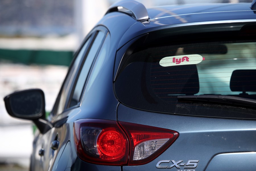 The Lyft logo is displayed on a car on March 11, 2019 in San Francisco, California. (Justin Sullivan/Getty Images)