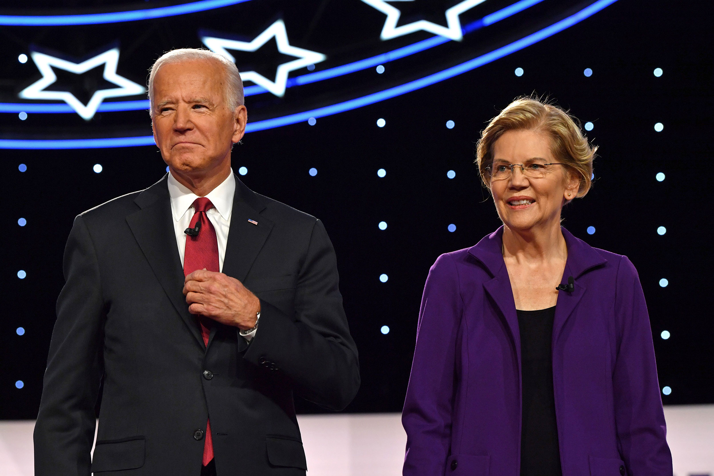 Democratic presidential hopefuls Former Vice President Joe Biden (L) and Massachusetts Senator Elizabeth Warren arrive onstage for the fourth Democratic primary debate of the 2020 presidential campaign season co-hosted by The New York Times and CNN at Otterbein University in Westerville, Ohio on October 15, 2019. (Nicholas Kamm / AFP via Getty Images)