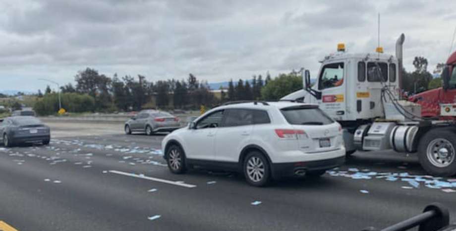 Hundreds of face masks are scattered across a highway in the Bay Area on April 29, 2020. (California Highway