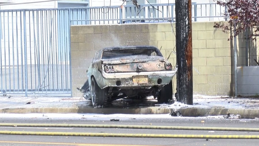 Authorities investigate the scene of a violent crash along Myrtle Avenue in Monrovia on April 4, 2020. (RMG News)