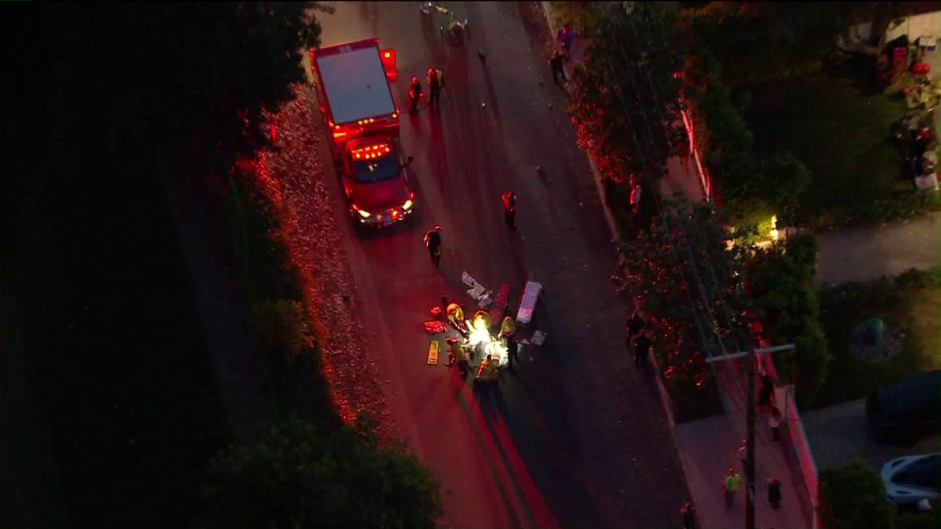 Sky5 footage showed a man and a woman being treated after getting hit by a car on May 11, 2020. (KTLA)