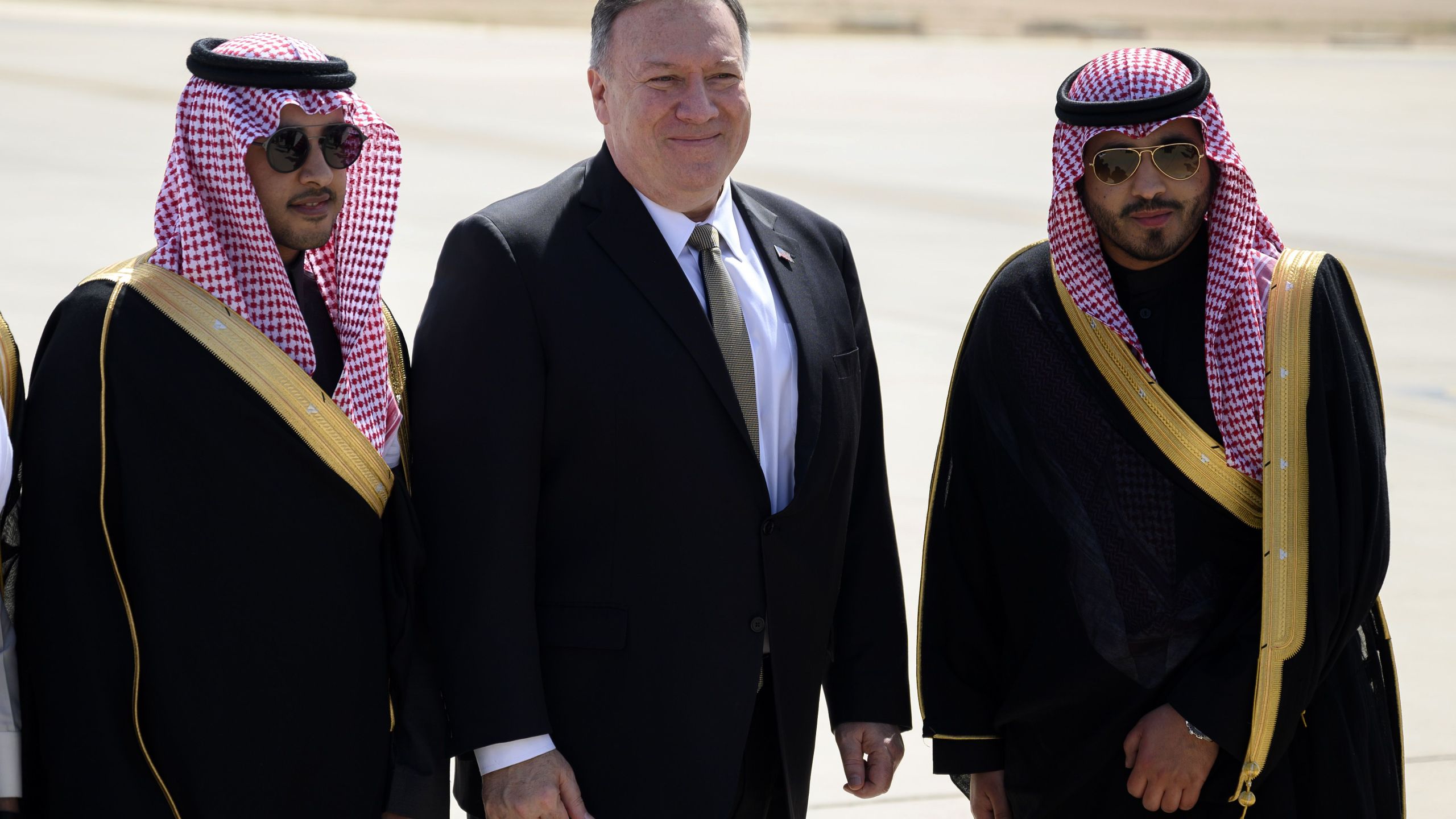 Saudi Undersecretary for Protocol Affairs Azzam bin AbdulKarim Al-Gain waves to U.S. Secretary of State Mike Pompeo off as he boards a plane at the King Khalid International Airport in the Saudi capital Riyadh, before his departure on Feb. 21, 2020. (ANDREW CABALLERO-REYNOLDS/AFP via Getty Images)