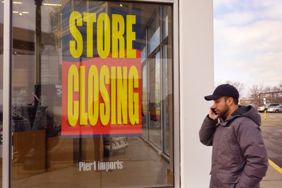 Store closing signs hang in the window of a Pier 1 imports store on February 18, 2020 in Chicago, Illinois. (Scott Olson/Getty Images)