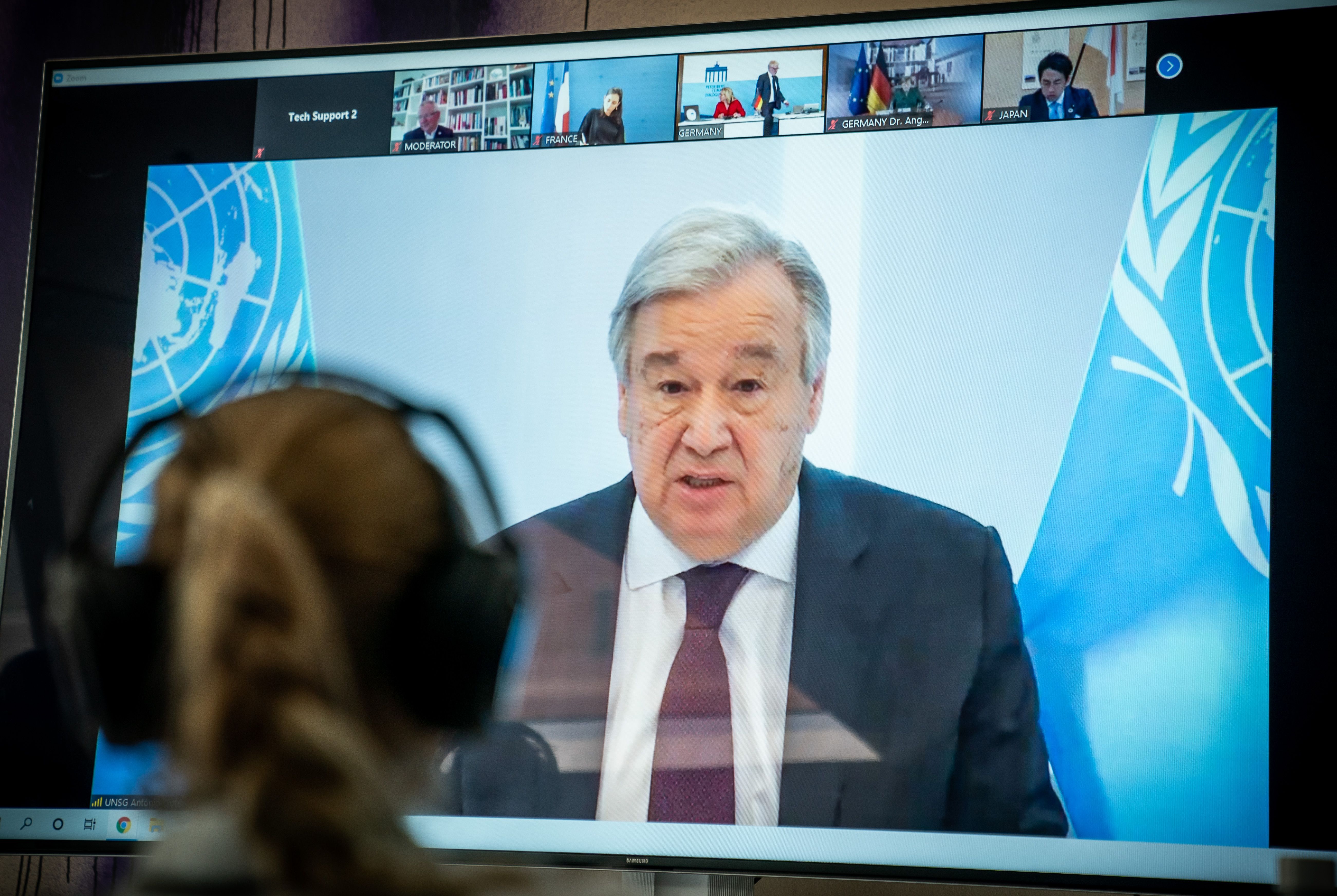 United Nations Secretary-General Antonio Guterres is seen on a screen during the video conference of the Petersberg Climate Dialogue in Berlin on April 28, 2020. (MICHAEL KAPPELER/POOL/AFP via Getty Images)