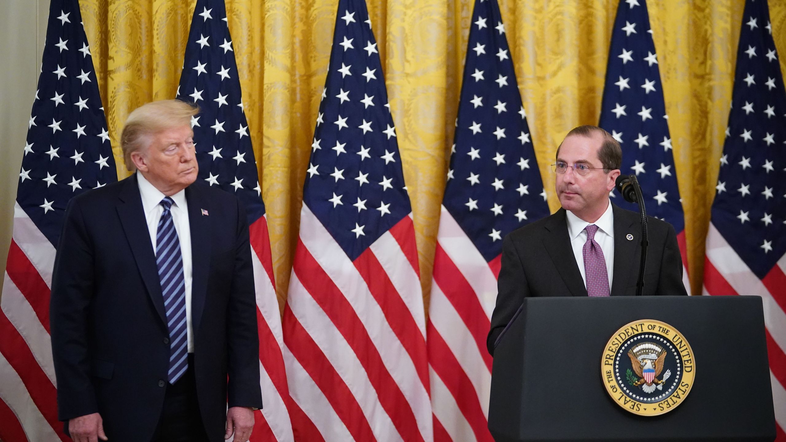 President Donald Trump listens as Secretary of Health and Human Services Alex Azar speaks on protecting Americas seniors from the COVID-19 pandemic in the East Room of the White House in Washington, D.C. on April 30, 2020. (MANDEL NGAN/AFP via Getty Images)