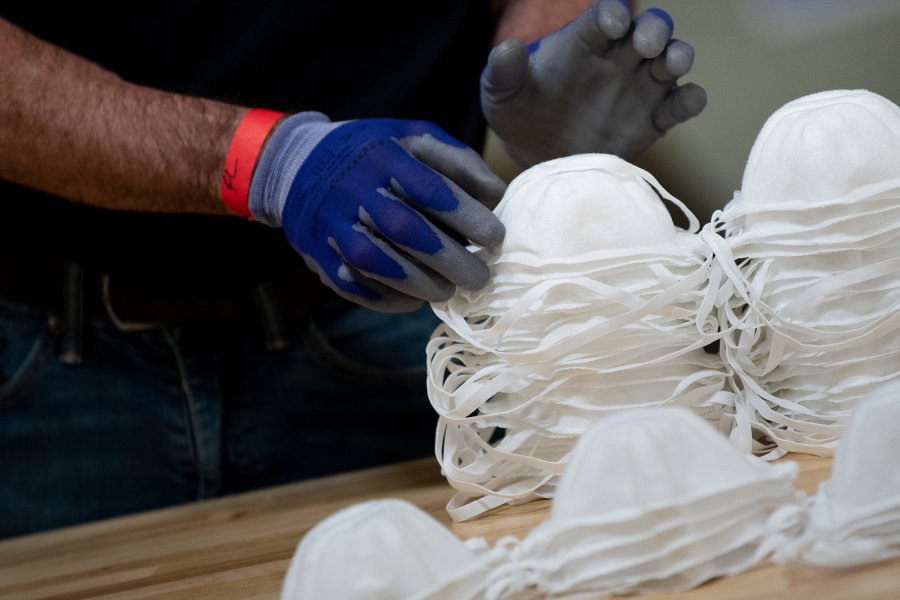 A worker at a Honeywell International factory in Phoenix, Arizona, produces N95 masks on May 5, 2020. (Brendan Smialowski / AFP / Getty Images)