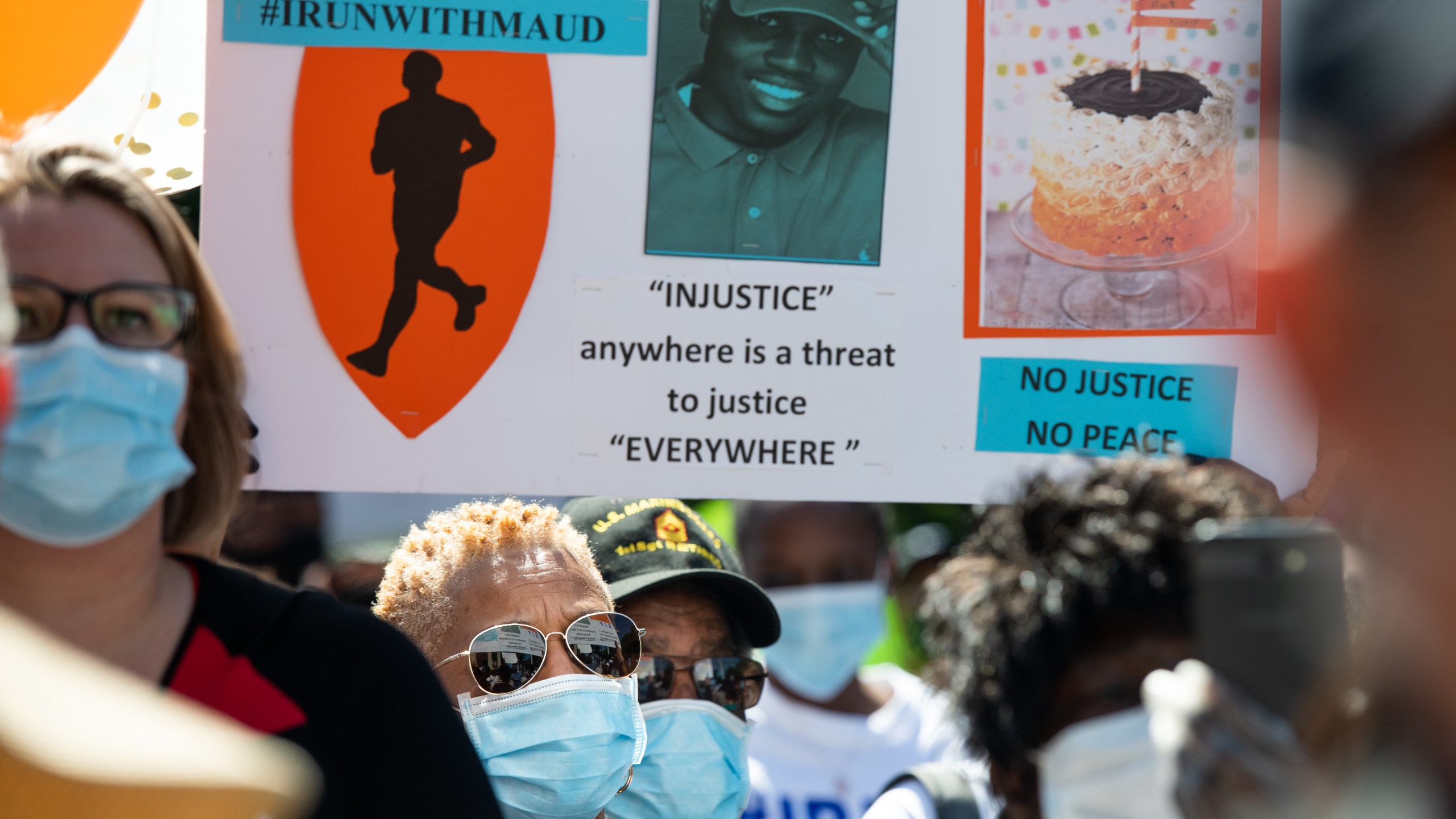 Demonstrators protest the shooting death of Ahmaud Arbery at the Glynn County Courthouse on May 8, 2020, in Brunswick, Georgia. Gregory McMichael and Travis McMichael were arrested the previous night and charged with murder. (Sean Rayford/Getty Images)