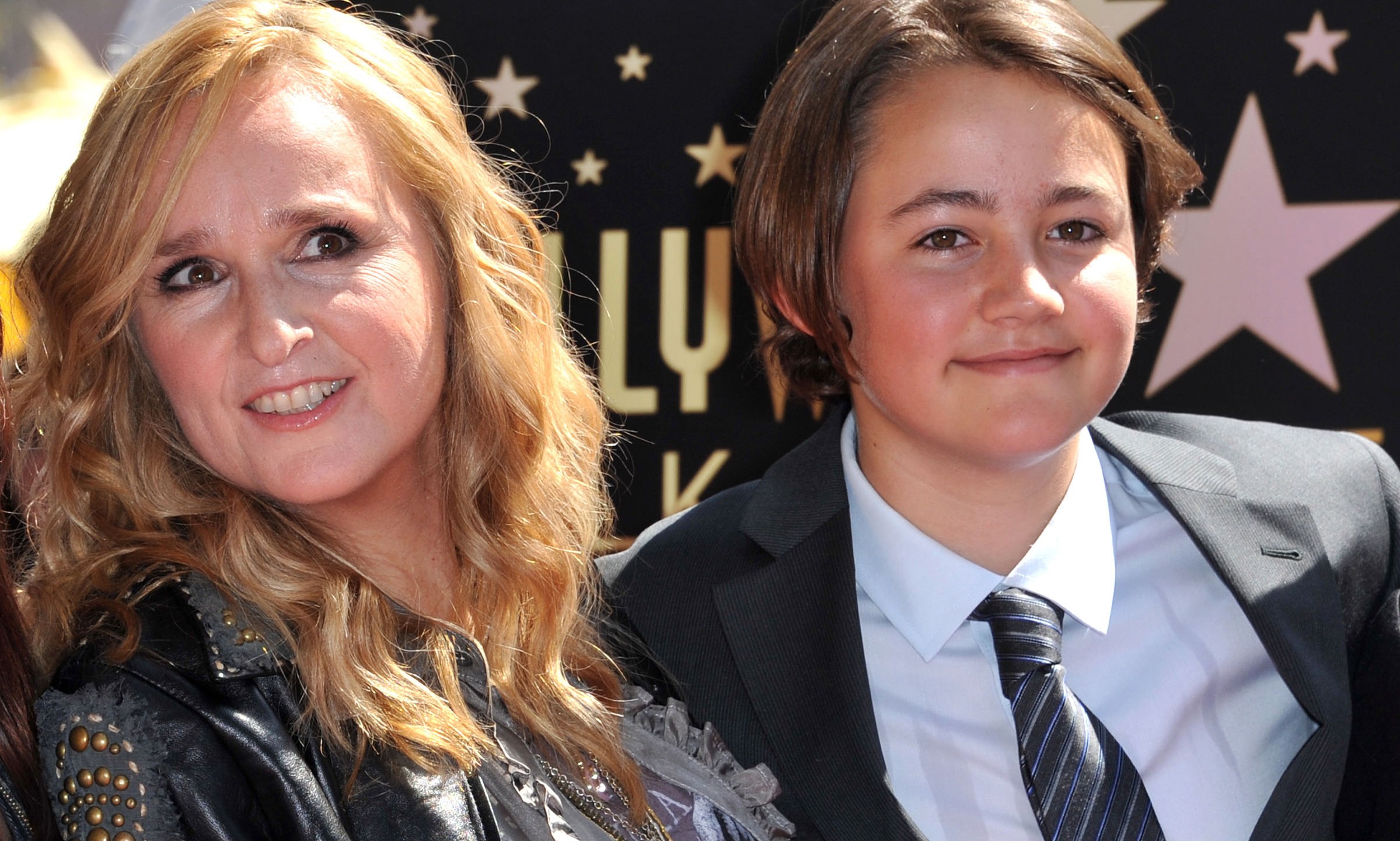 This photo taken on September 27, 2011 shows singer Melissa Etheridge posing with her son Beckett during her Walk of Fame ceremony held at the Hard Rock cafe in Hollywood. (CHRIS DELMAS/AFP via Getty Images)