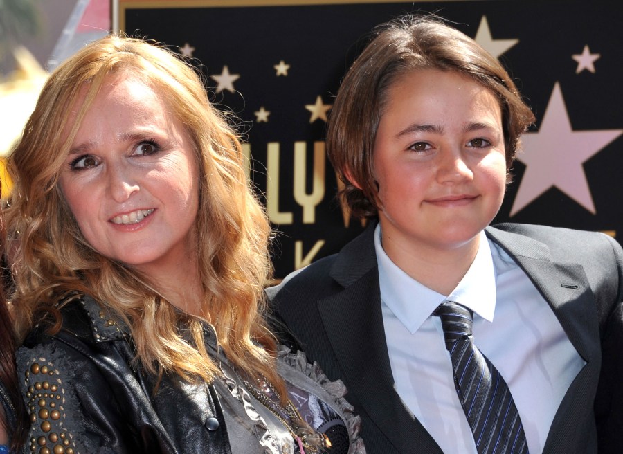 This photo taken on September 27, 2011 shows singer Melissa Etheridge posing with her son Beckett during her Walk of Fame ceremony held at the Hard Rock cafe in Hollywood. (CHRIS DELMAS/AFP via Getty Images)