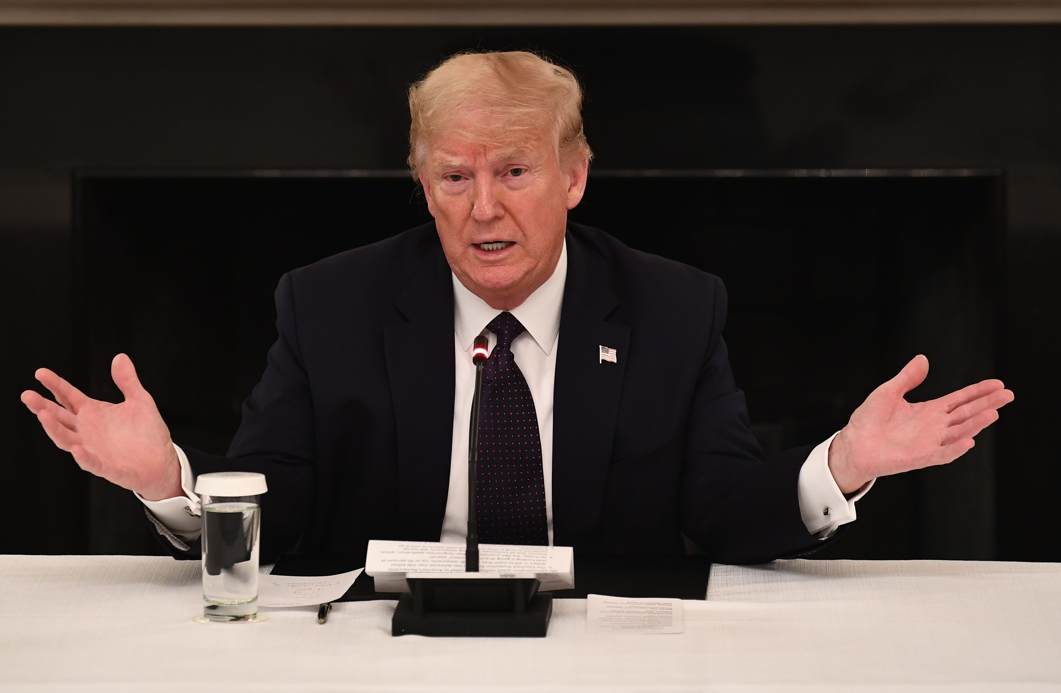 President Donald Trump speaks during a meeting with restaurant executives in the State Dining Room of the White House on May 18, 2020. (Brendan Smialowski / AFP / Getty Images)