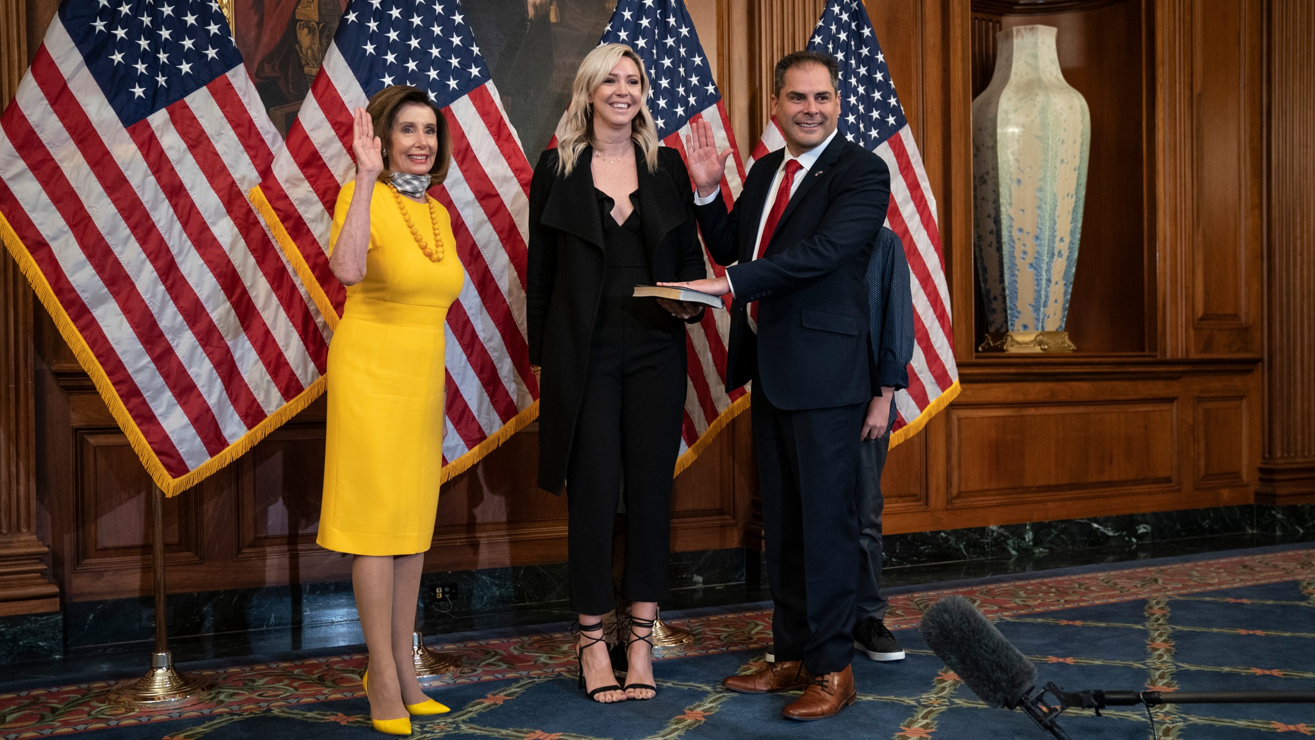 From left: Speaker of the House Nancy Pelosi participates in a ceremonial swearing-in with new Rep. Mike Garcia, with his wife Rebecca, at the U.S. Capitol on May 19, 2020 in Washington, D.C. (Drew Angerer/Getty Images)