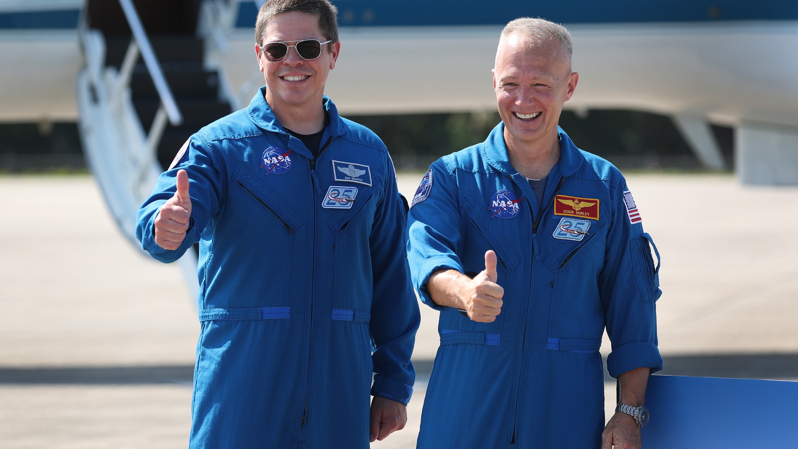 NASA astronauts Bob Behnken (left) and Doug Hurley (right) pose for the media after arriving at the Kennedy Space Center on May 20, 2020, in Cape Canaveral, Florida. (Joe Raedle/Getty Images)