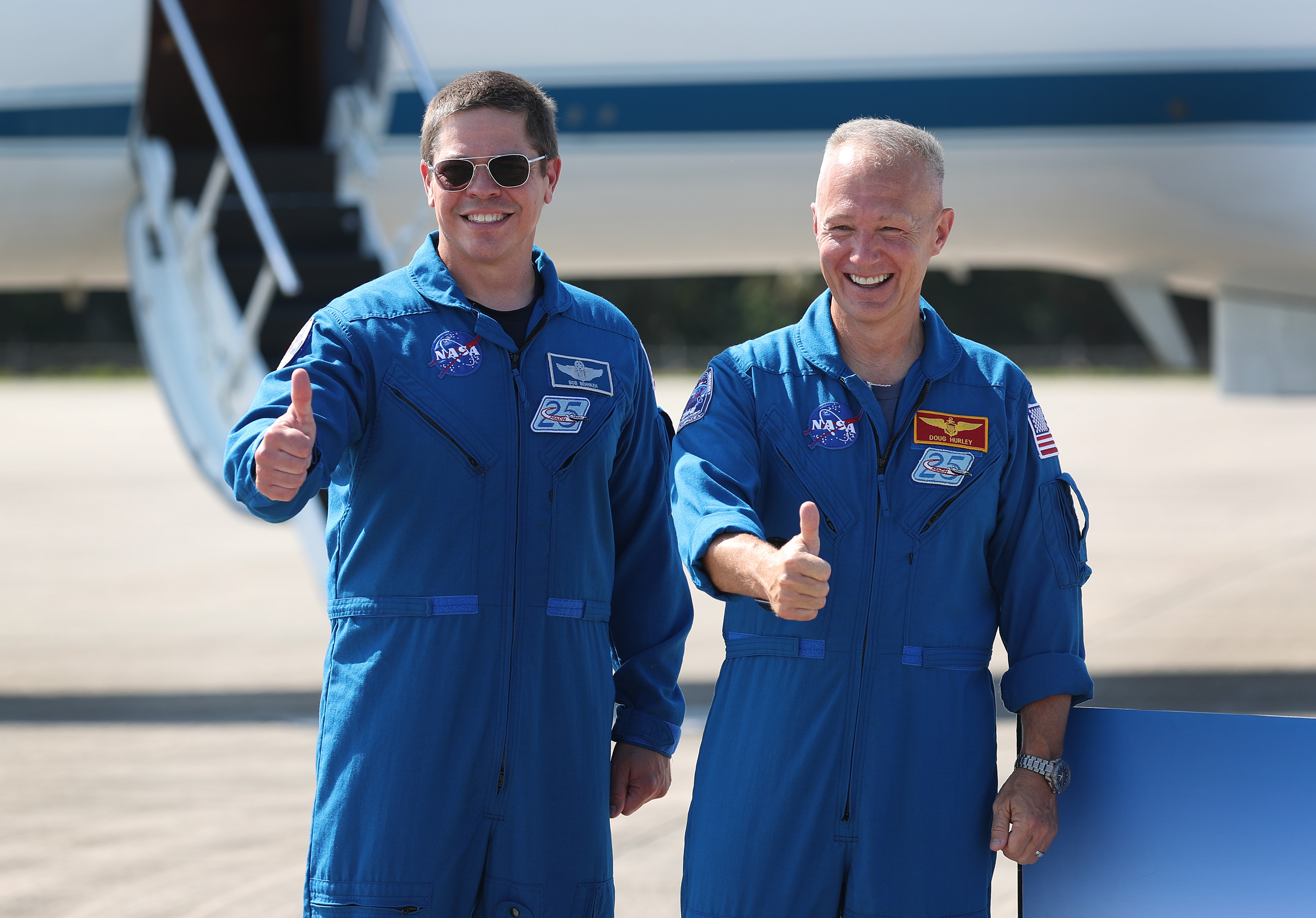 NASA astronauts Bob Behnken (left) and Doug Hurley (right) pose for the media after arriving at the Kennedy Space Center on May 20, 2020, in Cape Canaveral, Florida. (Joe Raedle/Getty Images)