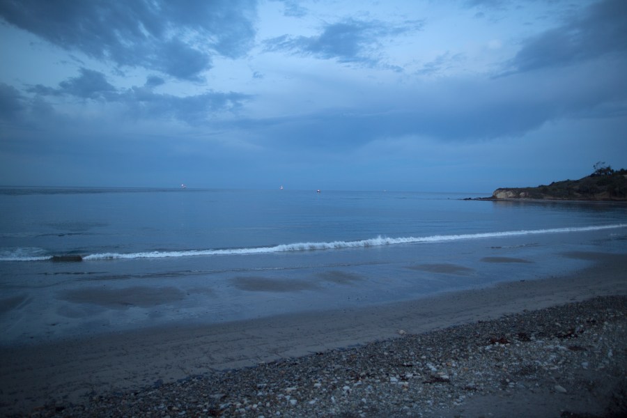 Water contaminated by an inland oil spill breaks at Refugio State Beach on May 20, 2015 north of Goleta, California. About 21,000 gallons spilled from an abandoned pipeline on the land near Refugio State Beach, spreading over about four miles of beach within hours. The largest oil spill ever in U.S. waters at the time occurred in the same section of the coast where numerous offshore oil platforms can be seen, giving birth to the modern American environmental movement. (Photo by David McNew/Getty Images)