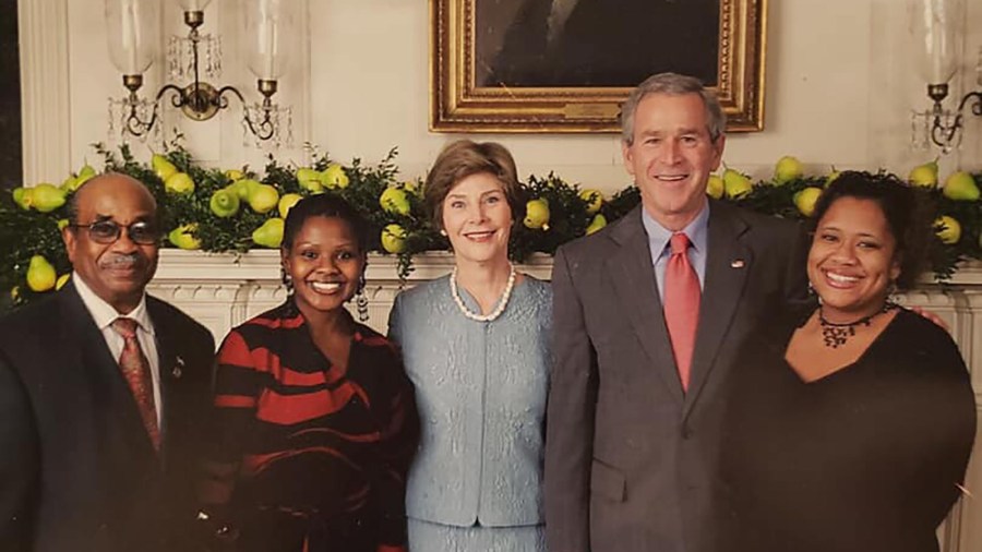 Former White House butler Wilson Roosevelt Jerman with then-President George W. Bush and First Lady Laura Bush. (Shanta Taylor Gay via CNN)