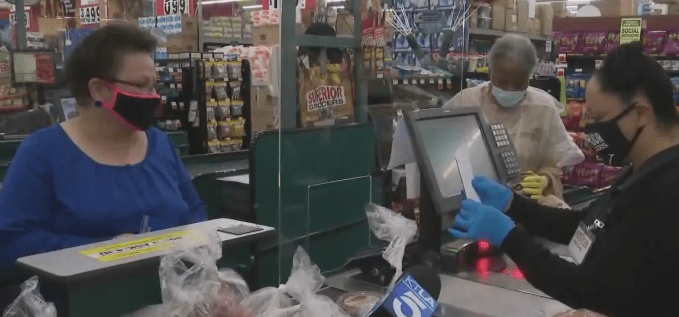 A shopper was surprised with free groceries at the Superior Grocer store in the Vermont-Slauson neighborhood on May 18, 2020. (KTLA)